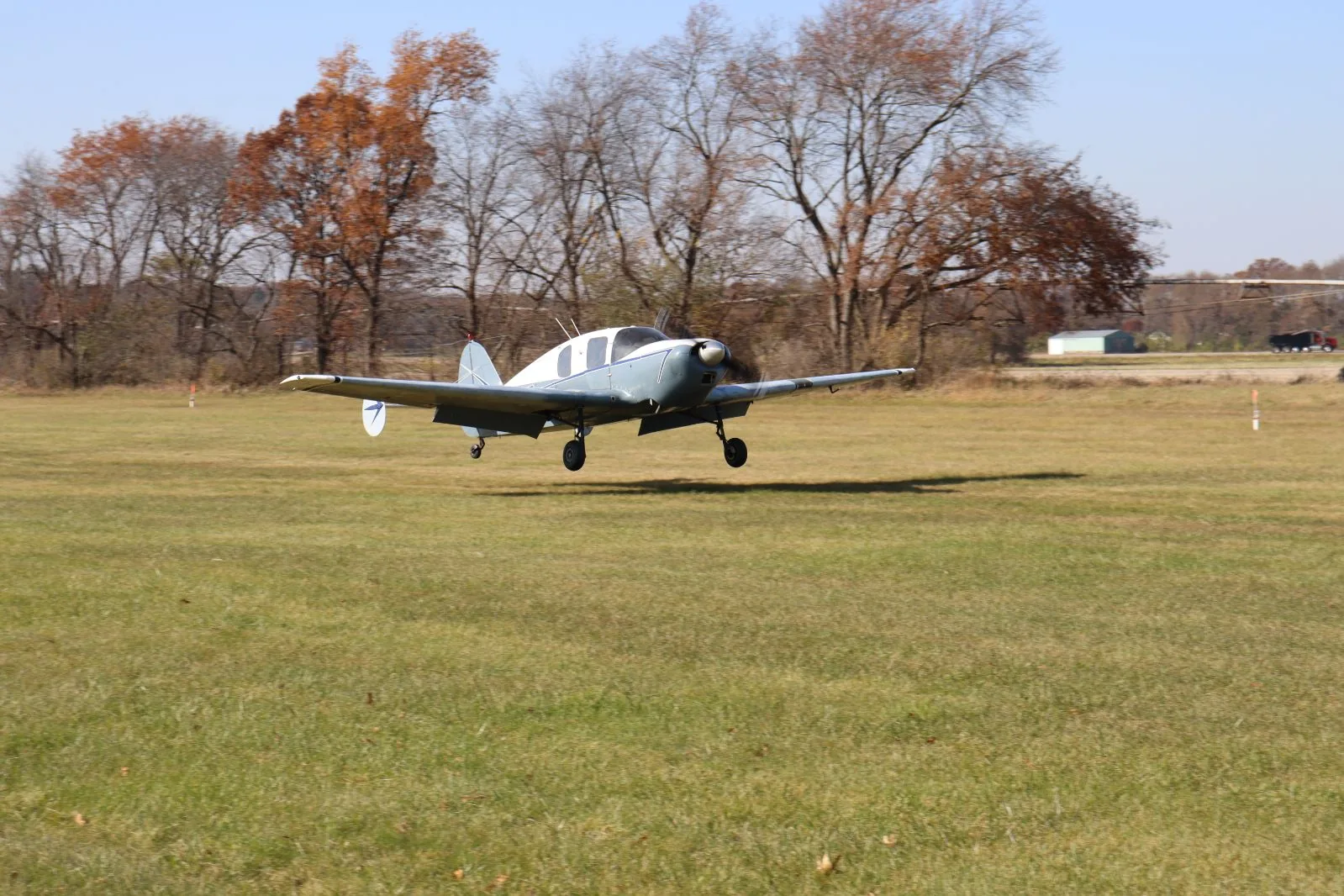 Aircraft landing on a grass runway